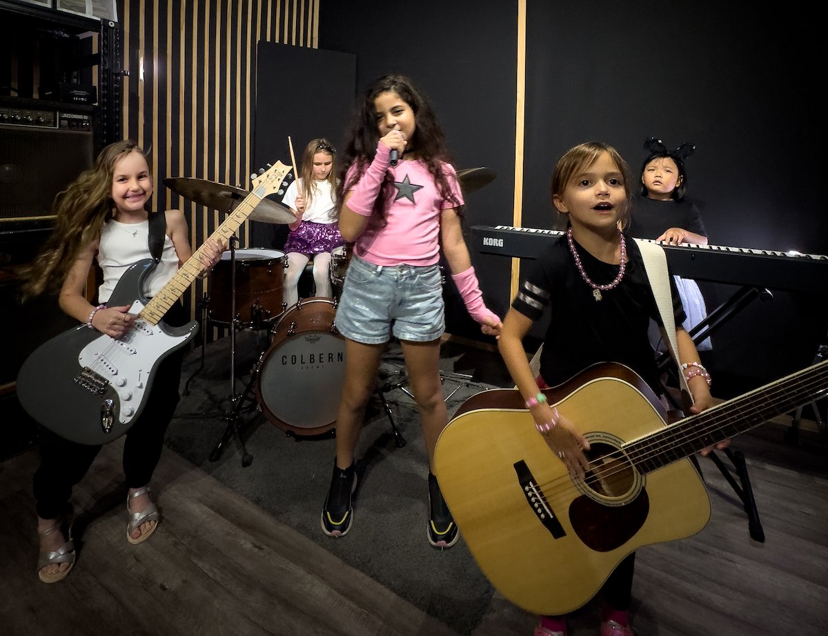 Students performing together in a band