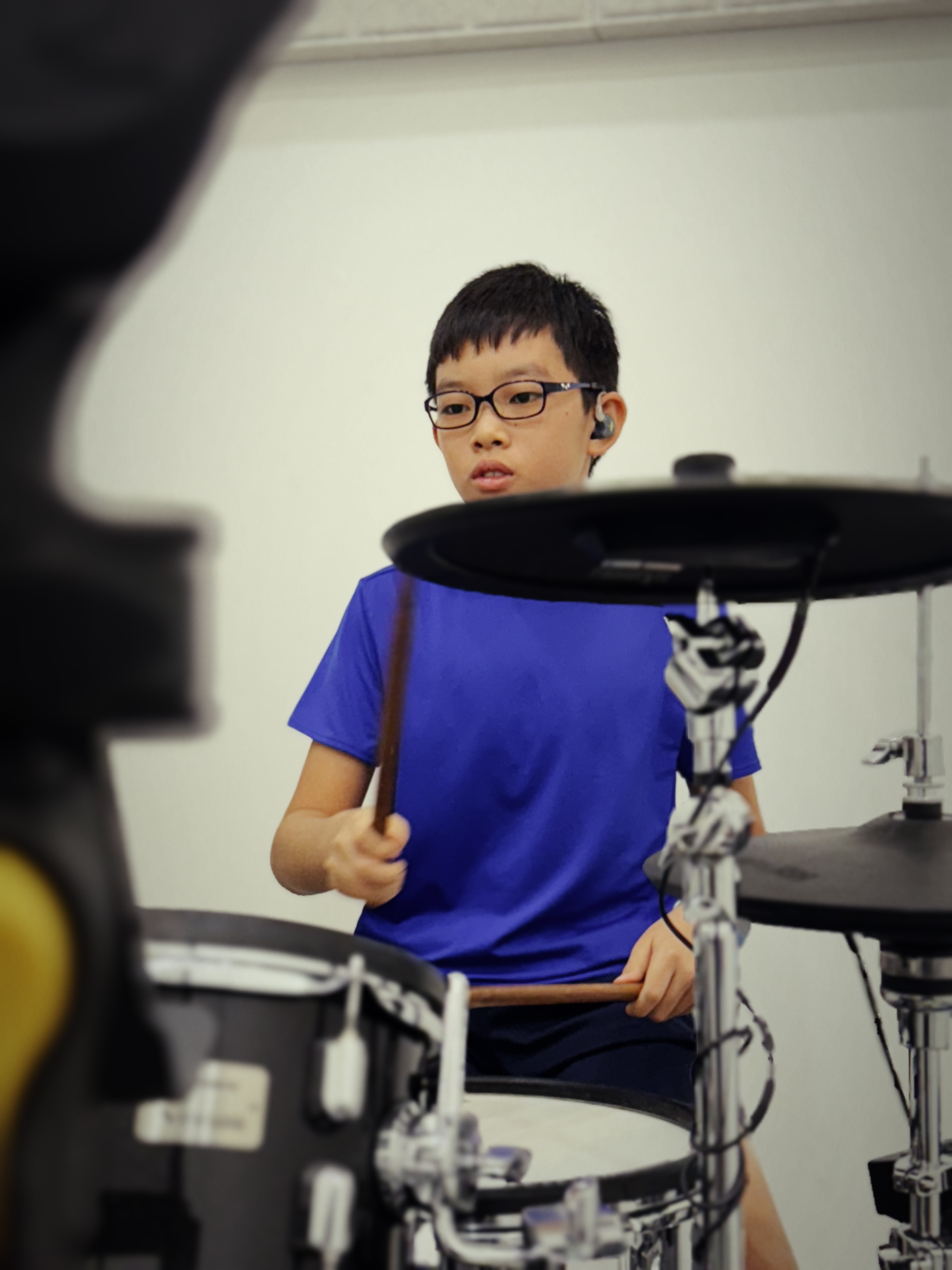 Student practicing drums