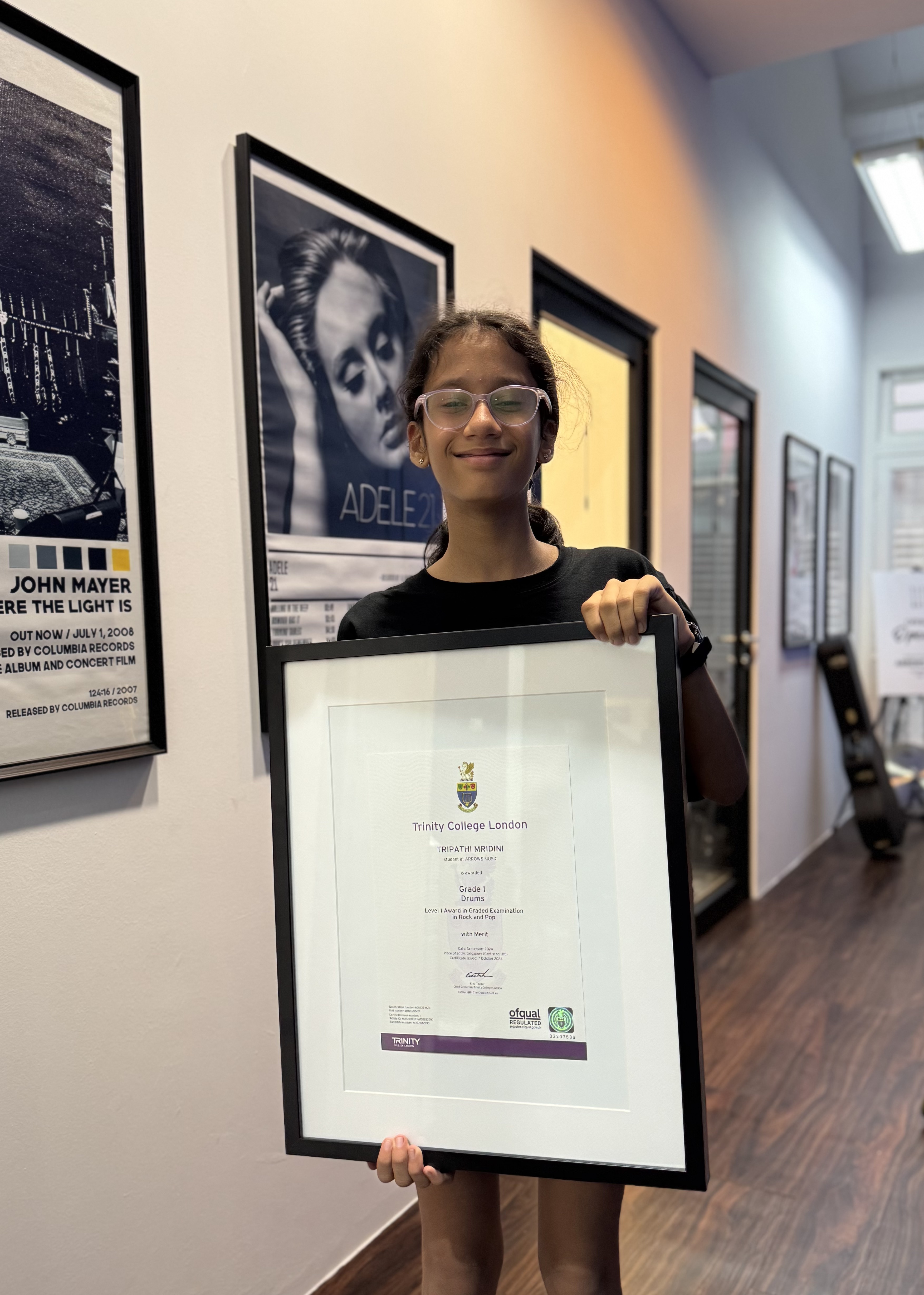 Tripathi Mridini with Trinity Grade 1 certificate